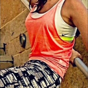 Nike Fly Burnout Dri-FIT Tank (Women's) in Coral